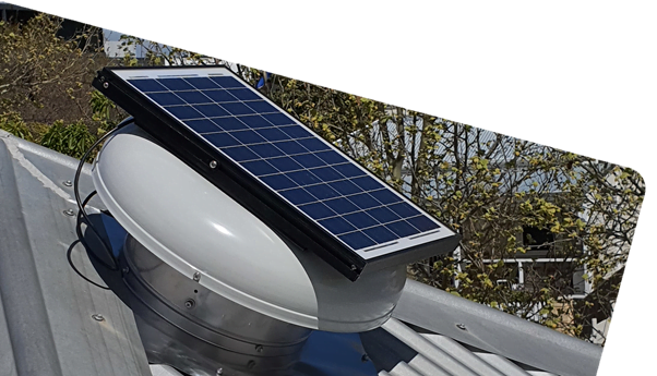 solar-powered fans on a roof